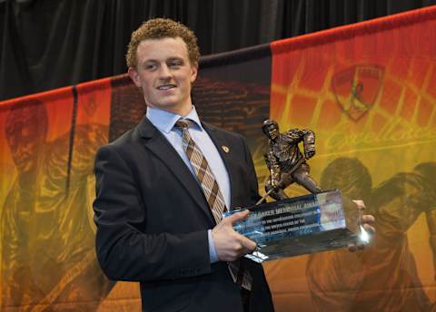 BOSTON, MA – APRIL 10: Jack Eichel #9 of the Boston University Terriers wins the Hobey Baker Memorial Award given annually to best player in NCAA Division I Men’s ice hockey at Matthews Arena on April 10, 2015 in Boston, Massachusetts. (Photo by Richard T Gagnon/Getty Images)