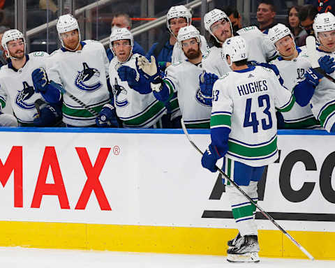 Oct 7, 2021; Edmonton, Alberta, CAN; Vancouver Canucks defensemen Quinn Hughes (43) celebrates a second permed goal against the Edmonton Oilers at Rogers Place. Mandatory Credit: Perry Nelson-USA TODAY Sports