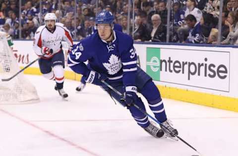 Apr 23, 2017; Toronto, Ontario, CAN; Toronto Maple Leafs center Auston Matthews (34) skates with the puck against the Washington Capitals in game six of the first round of the 2017 Stanley Cup Playoffs at Air Canada Centre. The Capitals beat the Maple Leafs 2-1 in overtime. Mandatory Credit: Tom Szczerbowski-USA TODAY Sports