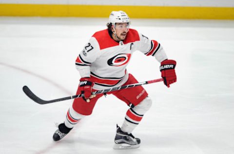 ANAHEIM, CA – DECEMBER 11: Carolina Hurricanes captain Justin Faulk (27) in action during the third period of a game against the Anaheim Ducks, on December 11, 2017, played at the Honda Center in Anaheim, CA. (Photo by John Cordes/Icon Sportswire via Getty Images)