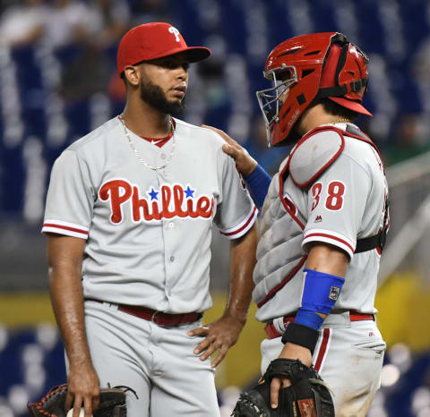 A prince (Dominguez) and a whipping boy (Alfaro) powwow on the mound during the hurler’s struggles. Photo by Eric Espada/Getty Images.