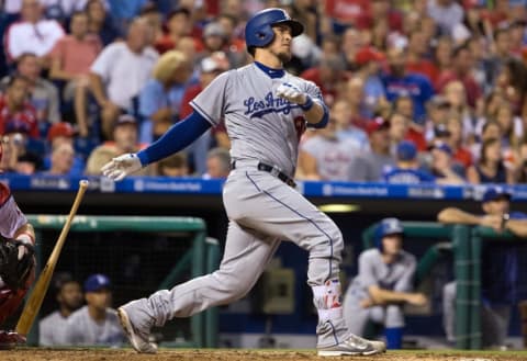 Aug 18, 2016; Philadelphia, PA, USA; Los Angeles Dodgers catcher Yasmani Grandal (9) hits a solo home run during the fourth inning against the Philadelphia Phillies at Citizens Bank Park. Mandatory Credit: Bill Streicher-USA TODAY Sports