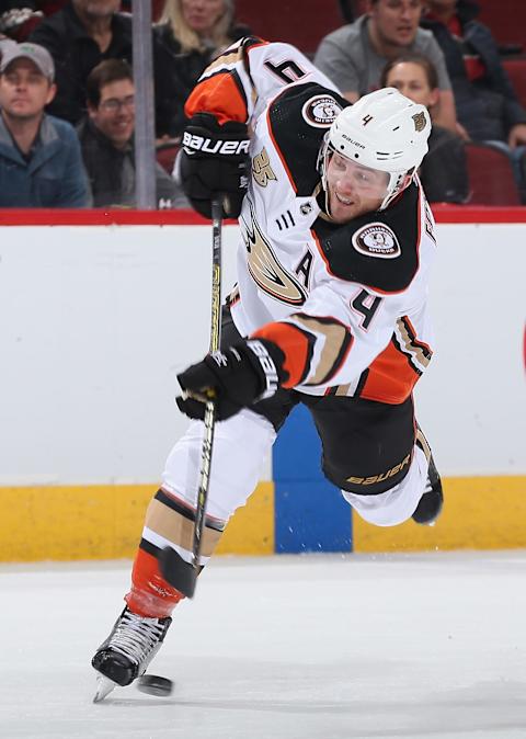 GLENDALE, ARIZONA – MARCH 14: Cam Fowler #4 of the Anaheim Ducks shoots the puck against the Arizona Coyotes during the second period of the NHL game at Gila River Arena on March 14, 2019, in Glendale, Arizona. (Photo by Christian Petersen/Getty Images)