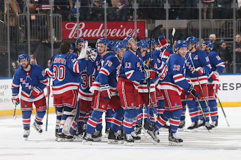 NEW YORK, NY – DECEMBER 27: The New York Rangers celebrate after defeating the Washington Capitals 1-0 in the shootout at Madison Square Garden on December 27, 2017 in New York City. (Photo by Jared Silber/NHLI via Getty Images)