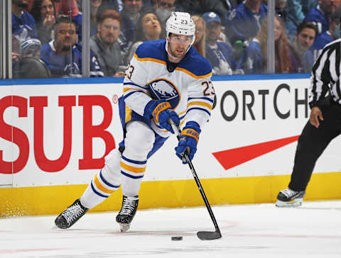 TORONTO, ON – APRIL 12: Mattias Samuelsson #23 of the Buffalo Sabres skates with the puck against the Toronto Maple Leafs during an NHL game at Scotiabank Arena on April 12, 2022 in Toronto, Ontario, Canada. The Sabres defeated the Maple Leafs 5-2. (Photo by Claus Andersen/Getty Images)