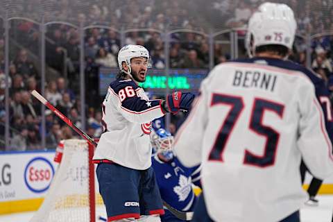 Feb 11, 2023; Toronto, Ontario, CAN; Columbus Blue Jackets forward Kirill Marchenko (86) reacts after scoring against the Toronto Maple Leafs during the second period at Scotiabank Arena. Mandatory Credit: John E. Sokolowski-USA TODAY Sports