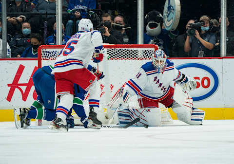 Nov 2, 2021; Vancouver, British Columbia, CAN; New York Rangers goalie Igor Shesterkin (31) makes a save against the Vancouver Canucks in the second period at Rogers Arena. Mandatory Credit: Bob Frid-USA TODAY Sports