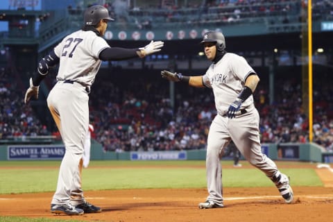 BOSTON, MA – APRIL 11: Gary Sanchez #24 of the New York Yankees, right, celebrates with Giancarlo Stanton #27 after hitting a two run home run during the first inning against the Boston Red Sox at Fenway Park on April 11, 2018 in Boston, Massachusetts. (Photo by Maddie Meyer/Getty Images)