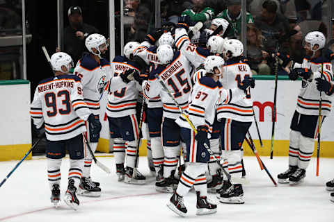 DALLAS, TEXAS – MARCH 03: The Edmonton Oilers celebrate a 2-1 win in overtime against the Dallas Stars at American Airlines Center on March 03, 2020 in Dallas, Texas. (Photo by Ronald Martinez/Getty Images)