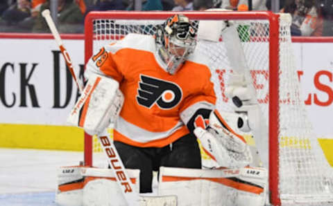 Mar 20, 2022; Philadelphia, Pennsylvania, USA; Philadelphia Flyers goaltender Carter Hart (79) makes a save against the New York Islanders during the third period at Wells Fargo Center. Mandatory Credit: Eric Hartline-USA TODAY Sports