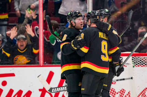 JT Miller, Brock Boeser and Elias Pettersson. Credit: Bob Frid-USA TODAY Sports