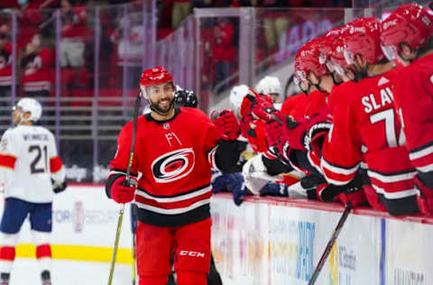 Mar 7, 2021; Raleigh, North Carolina, USA; Carolina Hurricanes center Vincent Trocheck (16) celebrates his first period goal against the Florida Panthers at PNC Arena. Mandatory Credit: James Guillory-USA TODAY Sports