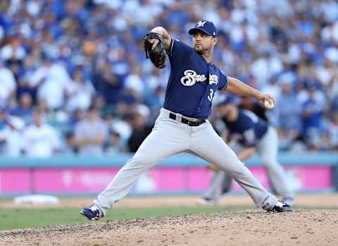 LOS ANGELES, CA – OCTOBER 17: Xavier Cedeno #33 of the Milwaukee Brewers pitches during Game 5 of the NLCS against the Los Angeles Dodgers at Dodger Stadium on Wednesday, October 17, 2018 in Los Angeles, California. (Photo by Rob Leiter/MLB Photos via Getty Images)