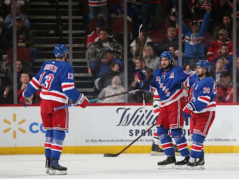 NEWARK, NJ – JANUARY 31: Mika Zibanejad #93 of the New York Rangers celebrates scoring a first period goal against the New Jersey Devils with teammates Kevin Hayes #13 and Mats Zuccarello #36 at the Prudential Center on January 31, 2019 in Newark, New Jersey. (Photo by Andy Marlin/NHLI via Getty Images)