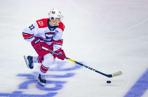 ROSEMONT, IL – JUNE 08: Charlotte Checkers defenseman Jesper Sellgren (32) controls the puck during game five of the AHL Calder Cup Finals between the Charlotte Checkers and the Chicago Wolves on June 8, 2019, at the Allstate Arena in Rosemont, IL. (Photo by Patrick Gorski/Icon Sportswire via Getty Images)