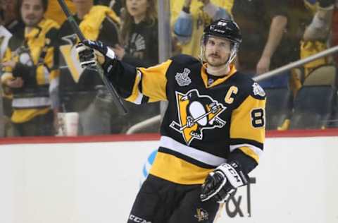 Jun 8, 2017; Pittsburgh, PA, USA; Pittsburgh Penguins center Sidney Crosby (87) celebrates the victory against the Nashville Predators following the third period in game five of the 2017 Stanley Cup Final at PPG PAINTS Arena. Mandatory Credit: Charles LeClaire-USA TODAY Sports