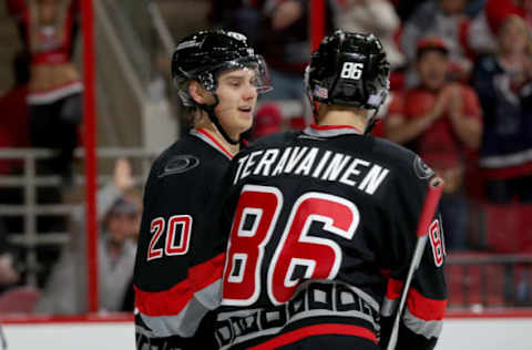 RALEIGH, NC – NOVEMBER 12: Sebastian Aho #20 of the Carolina Hurricanes celebrates with teammate Teuvo Teravainen #86 during an NHL game against the Washington Capitals on November 12, 2016 at PNC Arena in Raleigh, North Carolina. (Photo by Gregg Forwerck/NHLI via Getty Images)