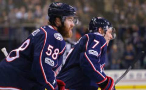 Columbus Blue Jackets defenseman David Savard (58) skates with defenseman Jack Johnson (7) (Aaron Doster-USA TODAY Sports)