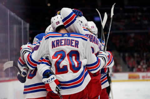 WASHINGTON, DC – OCTOBER 18: Artemi Panarin #10 of the New York Rangers celebrates with his teammates after scoring a goal in the second period against the Washington Capitals at Capital One Arena on October 18, 2019 in Washington, DC. (Photo by Patrick McDermott/NHLI via Getty Images)