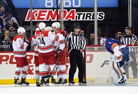 NEW YORK, NY – NOVEMBER 16: The Carolina Hurricanes celebrate a second period goal by Derek Ryan #7 (l) against Thomas Greiss #1 of the New York Islanders at the Barclays Center on November 16, 2017 in the Brooklyn borough of New York City. (Photo by Bruce Bennett/Getty Images)