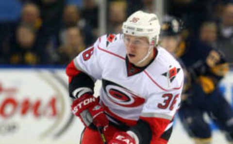 Jan. 25, 2013; Buffalo, NY, USA; Carolina Hurricanes left wing Jussi Jokinen (36) brings the puck up ice during the first period against the Buffalo Sabres at First Niagara Center. Mandatory Credit: Timothy T. Ludwig-USA TODAY Sports