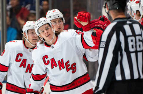 TORONTO, ON – DECEMBER 23: Erik Haula #56 of the Carolina Hurricanes celebrates with teammates during the second period against the Toronto Maple Leafs at the Scotiabank Arena on December 23, 2019, in Toronto, Ontario, Canada. (Photo by Kevin Sousa/NHLI via Getty Images)