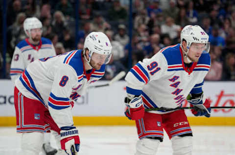 COLUMBUS, OHIO – APRIL 08: Jacob Trouba #8 of the New York Rangers and Vladimir Tarasenko #91 of the New York Rangers line up for a face-off during the second period against the Columbus Blue Jackets at Nationwide Arena on April 08, 2023, in Columbus, Ohio. (Photo by Jason Mowry/Getty Images)