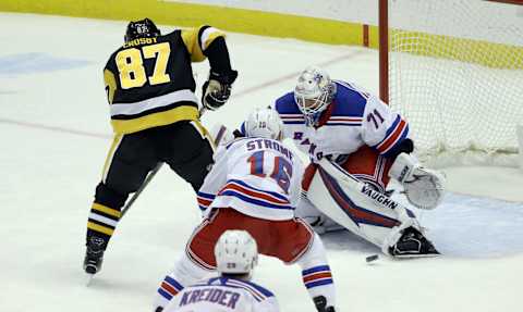 New York Rangers goaltender Keith Kinkaid (71) makes a save against Pittsburgh Penguins center Sidney Crosby (87) Credit: Charles LeClaire-USA TODAY Sports