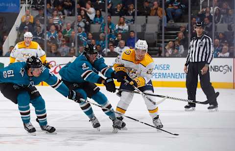 SAN JOSE, CA – NOVEMBER 01: Kevin Fiala #22 of the Nashville Predators skates against Justin Braun #61 and Brenden Dillon #4 of the San Jose Sharks at SAP Center on November 1, 2017 in San Jose, California. (Photo by Rocky W. Widner/NHL/Getty Images)