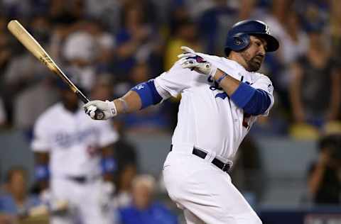 Oct 20, 2016; Los Angeles, CA, USA; Los Angeles Dodgers first baseman Adrian Gonzalez (23) hits a RBI ground out in the fourth inning against the Chicago Cubs in game five of the 2016 NLCS playoff baseball series against the Los Angeles Dodgers at Dodger Stadium. MLB. Mandatory Credit: Kelvin Kuo-USA TODAY Sports