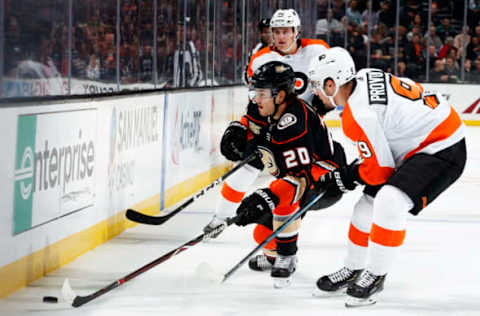 ANAHEIM, CA – OCTOBER 30: Pontus Aberg #20 of the Anaheim Ducks battles for the puck against Ivan Provorov #9 and Nicolas Aube-Kubel #62 of the Philadelphia Flyers during the game on October 30, 2018, at Honda Center in Anaheim, California. (Photo by Debora Robinson/NHLI via Getty Images)