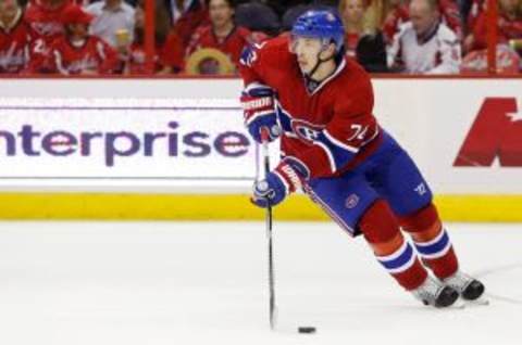 Oct 9, 2014; Washington, DC, USA; Montreal Canadiens defenseman Alexei Emelin (74) skates with the puck against the Washington Capitals at Verizon Center. Mandatory Credit: Geoff Burke-USA TODAY Sports