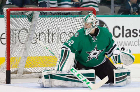 DALLAS, TX – MARCH 23: Kari Lehtonen #32 of the Dallas Stars blocks a shot during pregame warm up before the Stars take on the Buffalo Sabres at American Airlines Center on March 23, 2015 in Dallas, Texas. (Photo by Tom Pennington/Getty Images)