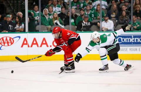 DALLAS, TX – FEBRUARY 23: Dallas Stars defenseman Miro Heiskanen (4) stretches to defend Carolina Hurricanes right wing Justin Williams (14) during the game between the Carolina Hurricanes and the Dallas Stars on February 23, 2019 at American Airlines Center in Dallas, TX. (Photo by Andrew Dieb/Icon Sportswire via Getty Images)