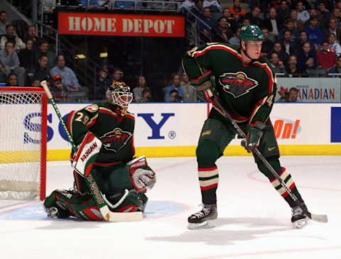 TORONTO, ON – OCTOBER 25: Andy Sutton #42 and Manny Fernandez #35 of the Minnesota Wild skates against the Toronto Maple Leafs during NHL game action on October 25, 2000 at Air Canada Centre in Toronto, Ontario, Canada. (Photo by Graig Abel/Getty Images)