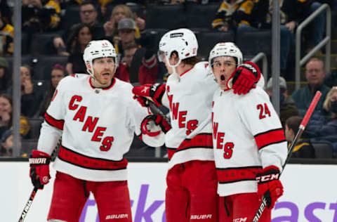 BOSTON, MA – FEBRUARY 10: Andrei Svechnikov #37 of the Carolina Hurricanes celebrates his goal with teammates Ian Cole #28 and Seth Jarvis #24 during the second period at the TD Garden on February 10, 2022 in Boston, Massachusetts. (Photo by Richard T Gagnon/Getty Images)