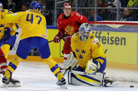 COPENHAGEN, DENMARK: Sweden’s Hampus Lindholm, goalie Anders Nilsson (L-R front), and in action in their 2018 IIHF World Championship Preliminary Round Group A ice hockey match at Royal Arena. Alexander Demianchuk/TASS (Photo by Alexander DemianchukTASS via Getty Images)