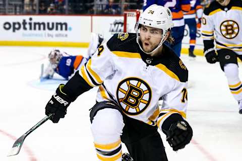 NEW YORK, NEW YORK – JANUARY 11: Jake DeBrusk #74 of the Boston Bruins celebrates his second period goal against the New York Islanders at Barclays Center on January 11, 2020 in New York City. (Photo by Mike Stobe/NHLI via Getty Images)