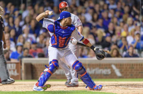 CHICAGO, IL – AUGUST 15: Chicago Cubs catcher Victor Caratini (20) looks to throw in the 7th inning during an MLB game between the Cincinnati Reds and the Chicago Cubs on August 15, 2017, at Wrigley Field in Chicago, IL. (Photo by Daniel Bartel/Icon Sportswire via Getty Images)