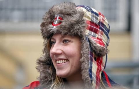 Apr 30, 2016; Minneapolis, MN, USA; A Minnesota Twins fan dons her promotional bomber hat before the game against the Detroit Tigers at Target Field. Mandatory Credit: Bruce Kluckhohn-USA TODAY Sports