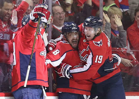 WASHINGTON, DC – APRIL 24: (L-R) Tom Wilson #43, Alex Ovechkin #8 and Nicklas Backstrom #19 of the Washington Capitals celebrate Wilson’s goal at 6:23 of the first period against the Carolina Hurricanes in Game Seven of the Eastern Conference First Round during the 2019 NHL Stanley Cup Playoffs at the Capital One Arena on April 24, 2019 in Washington, DC. (Photo by Patrick Smith/Getty Images)