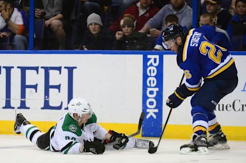 Feb 16, 2016; St. Louis, MO, USA; Dallas Stars center Cody Eakin (20) blocks a pass from St. Louis Blues center Paul Stastny (26) during the third period at the Scottrade Center. The Blues defeated the Stars 2-1 in overtime. Mandatory Credit: Jeff Curry-USA TODAY Sports