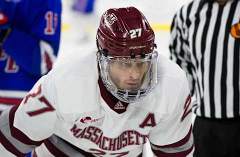 LOWELL, MA – FEBRUARY 21: Jake McLaughlin #27 of the Massachusetts Minutemen skates against the Massachusetts Lowell River Hawks during NCAA men’s hockey at the Tsongas Center on February 21, 2020 in Lowell, Massachusetts. The River Hawks won 3-2. (Photo by Richard T Gagnon/Getty Images)