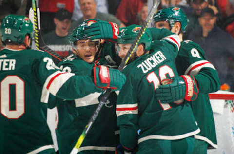 SAINT PAUL, MN – OCTOBER 20: (L-R) Jared Spurgeon #46, Jason Zucker #16 and Mikko Koivu #9 of the Minnesota Wild celebrate after scoring a goal against the Montreal Canadiens during the game at the Xcel Energy Center on October 20, 2019, in Saint Paul, Minnesota. (Photo by Bruce Kluckhohn/NHLI via Getty Images)