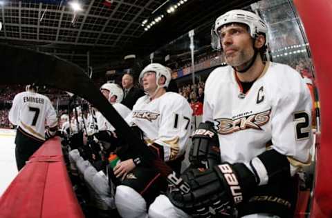 CALGARY, AB: Scott Niedermeyer #27 and Lubomir Visnovsky #17 of the Anaheim Ducks sit on the bench during a stoppage in play against the Calgary Flames on March 23, 2010. (Photo by Gerry Thomas/NHLI via Getty Images)