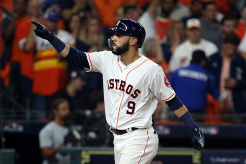 HOUSTON, TX – OCTOBER 18: Marwin Gonzalez #9 of the Houston Astros touches home plate and points to the crowd after hitting a solo home run in the seventh inning during Game 5 of the ALCS against the Boston Red Sox at Minute Maid Park on Thursday, October 18, 2018 in Houston, Texas. (Photo by Loren Elliott/MLB Photos via Getty Images)