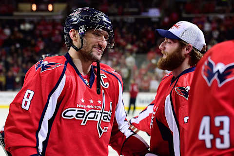 WASHINGTON, DC – JANUARY 10: Alex Ovechkin #8 of the Washington Capitals celebrates with his teammate Braden Holtby #70 after the Capitals defeated the Ottawa Senators 7-1 during an NHL game at Verizon Center on January 10, 2016 in Washington, DC. Ovechkin scored his 500th career NHL goal in the second period of the game. (Photo by Patrick McDermott/NHLI via Getty Images)