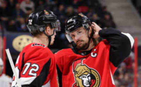 OTTAWA, ON – JANUARY 9: Teammates Thomas Chabot #72 and Erik Karlsson #65 of the Ottawa Senators chat during a stoppage in play in a game against the Chicago Blackhawks at Canadian Tire Centre on January 9, 2018 in Ottawa, Ontario, Canada. (Photo by Jana Chytilova/Freestyle Photography/Getty Images)