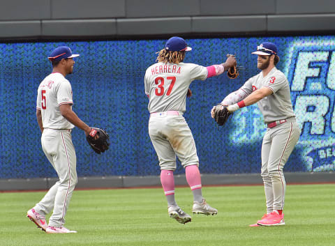 The outfielders celebrate another victory, and the Phillies will have a boatload of playoff-bound rituals. Photo by Keith Gillett/Icon Sportswire via Getty Images.