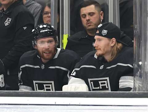 LOS ANGELES, CALIFORNIA – MARCH 02: Recently acquired Vladislav Gavrikov #84 and Joonas Korpisalo #70 of the Los Angeles Kings talk on the bench during the first period against the Montreal Canadiens at Crypto.com Arena on March 02, 2023, in Los Angeles, California. (Photo by Harry How/Getty Images)